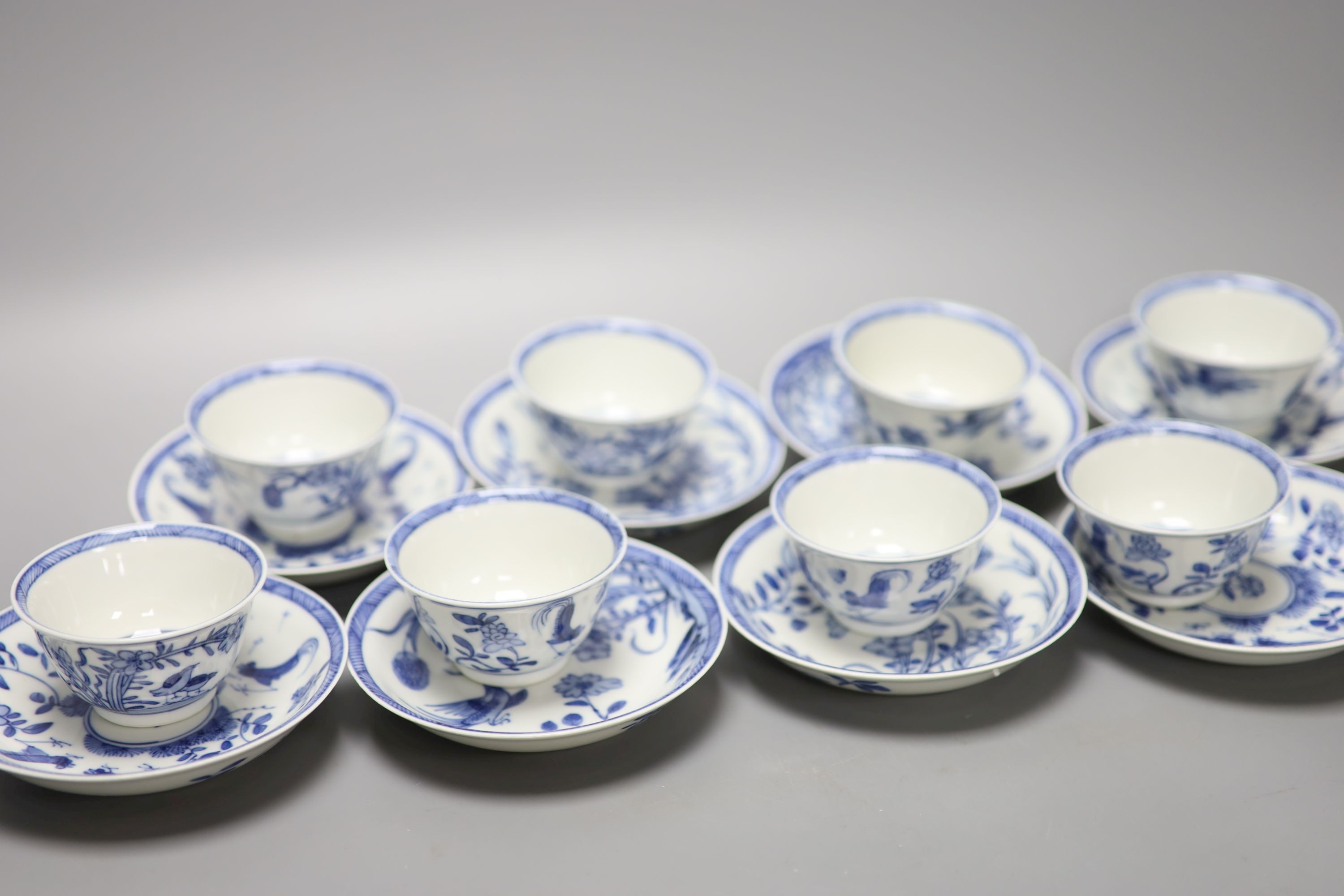 Five Chinese blue and white 'birds' tea bowls and four saucers and three 'chicken' tea bowls and four saucers (16)